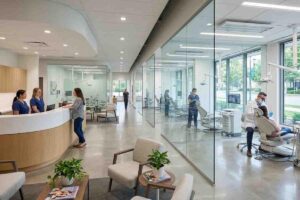 A high-resolution, realistic photo of a large and modern dental clinic interior. The space features a sleek curved reception desk, glass-walled treatment suites, and a professional, sunlit atmosphere. The text "Marketing for Dental Clinics" is elegantly overlaid in a sophisticated, minimal font, aligned with the CiCon Marketing aesthetic.